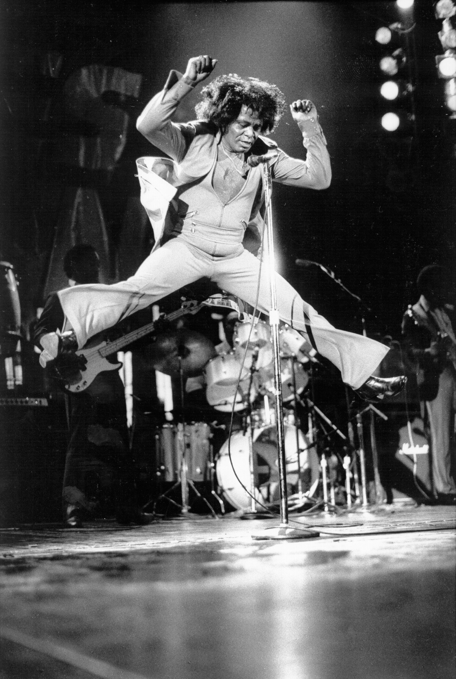 JB jumps at Hammersmith Odeon, London, May 23, 1985. Photo by David Corio via Michael Ochs Archives/Getty Images.